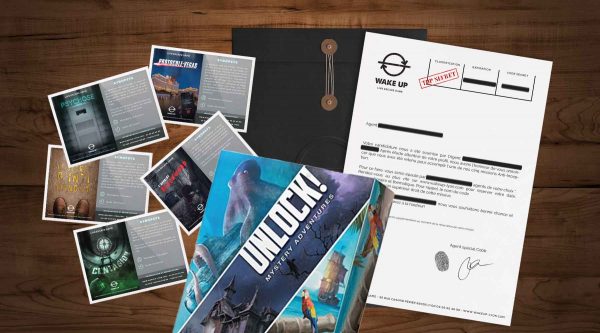Coffre Cadeau comprenant un bon pour une mission d'escape game et un lot de 3 jeux Unlock